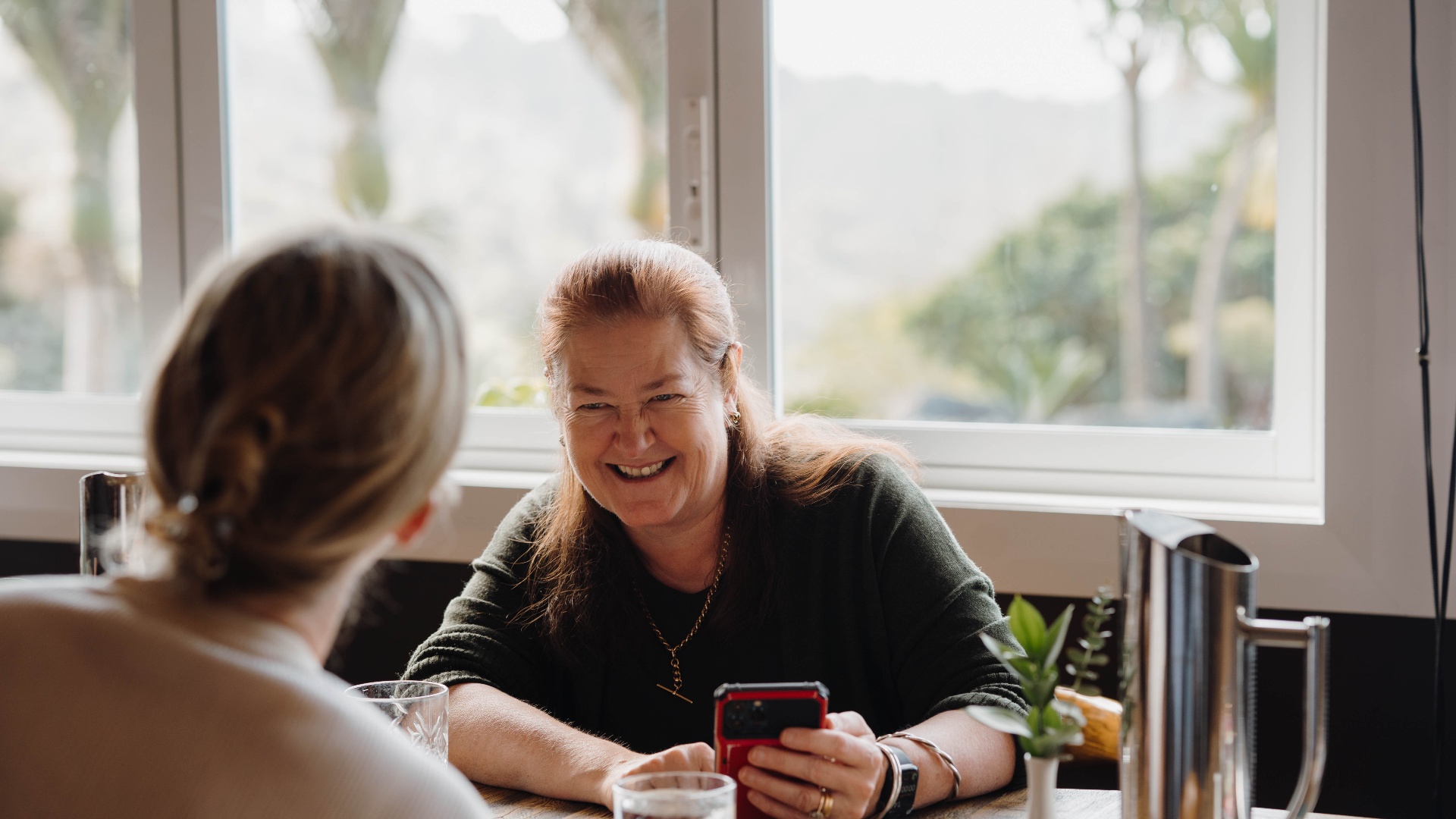 Members laughing at a workshop