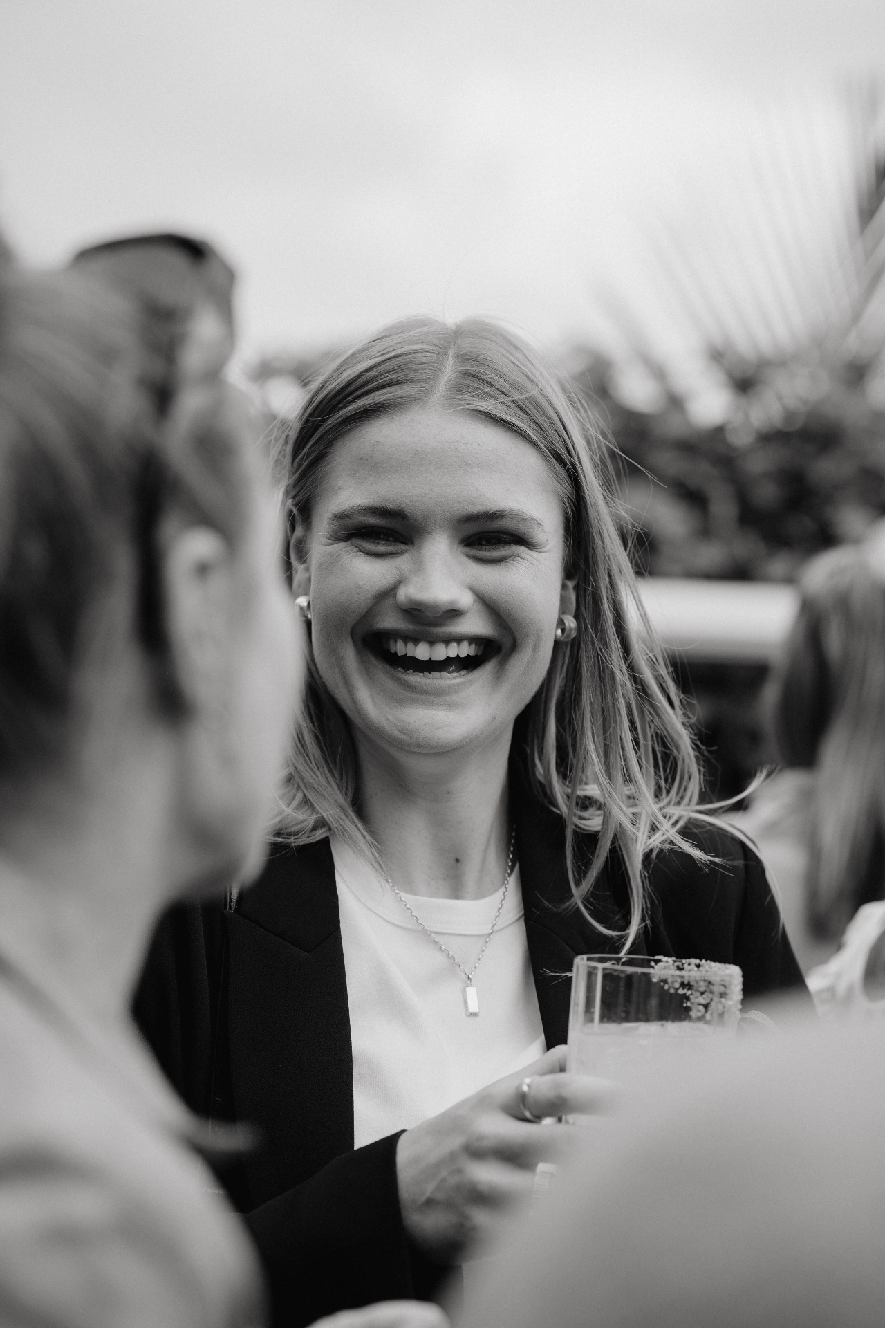 Member laughing at the garden party